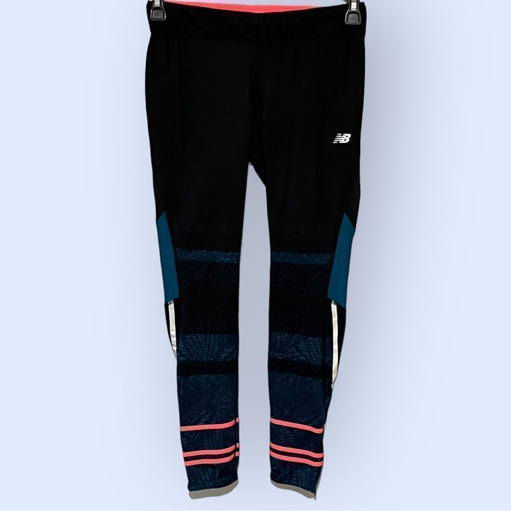 New Balance size M leggings with great geo- design and reflective strips EUC